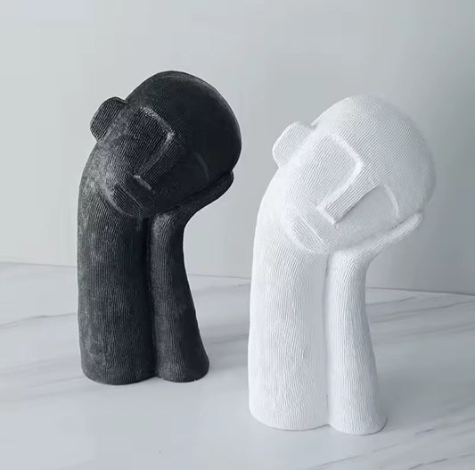 Schlafkopf-Skulptur